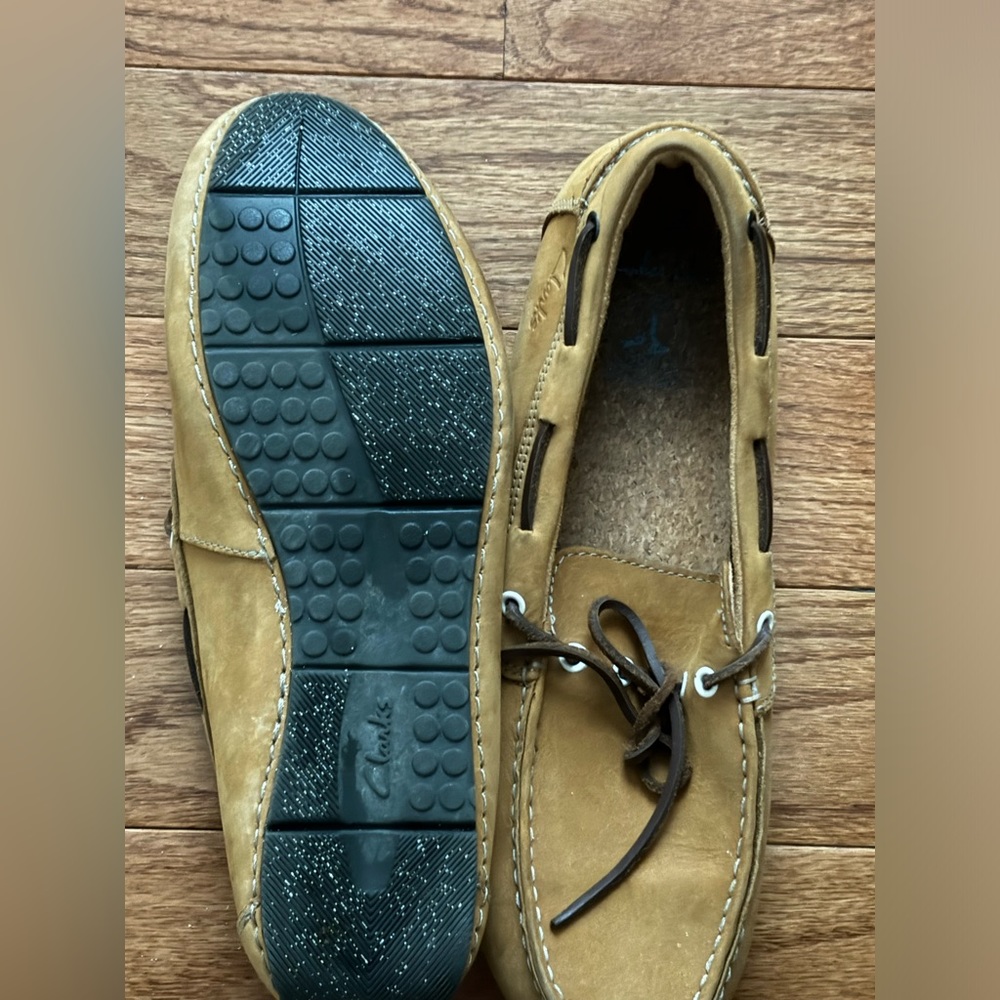 Clark’s beige slip-on loafers